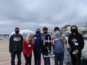 Ms. Beauving's class on a dock